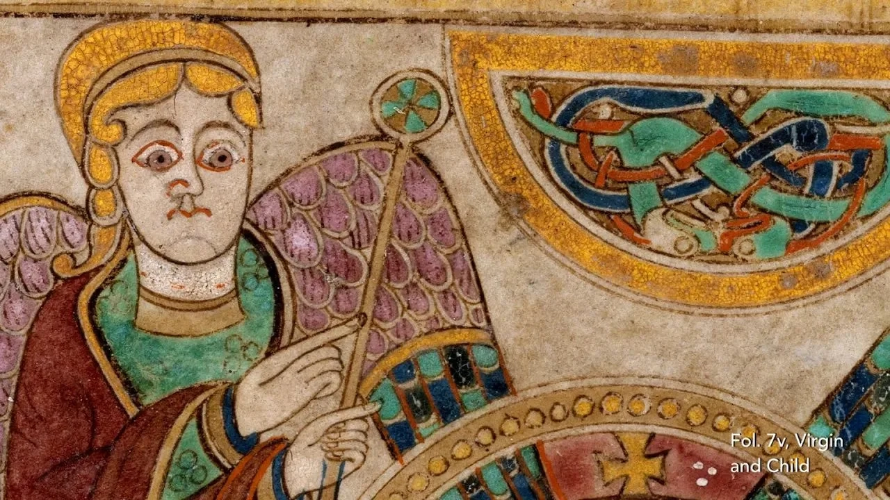 brightly coloured character close up from a section of the book of kells