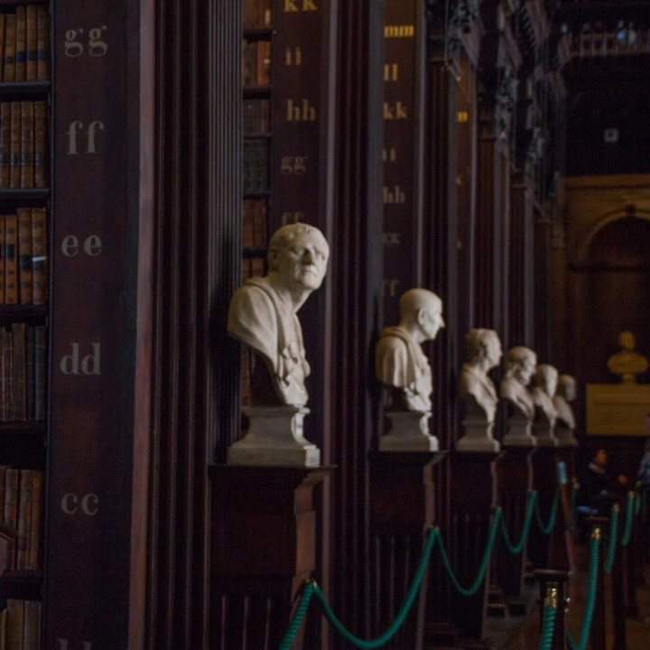 busts behind green velvet rope at old library trinity