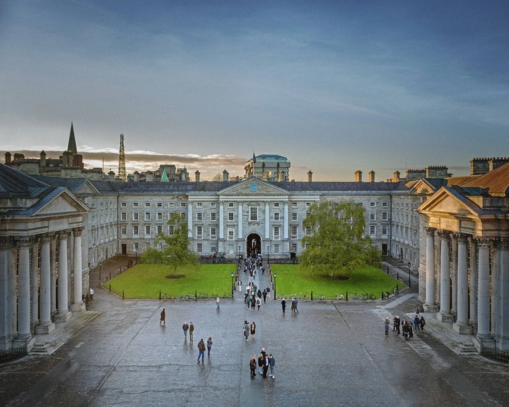 view of trinity college front square at sunset